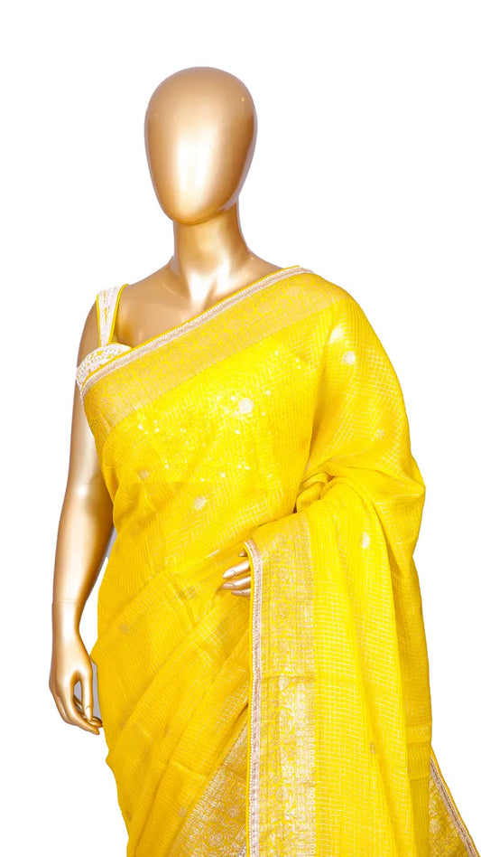 Yellow soft organza saree with Banarasi zari weaving, pearl border, and readymade designer handwork blouse
