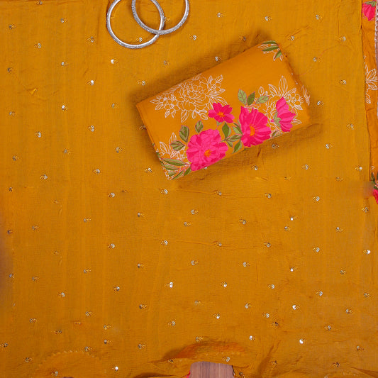 Mustard cotton unstitched suit with floral print and French knot handwork on neckline