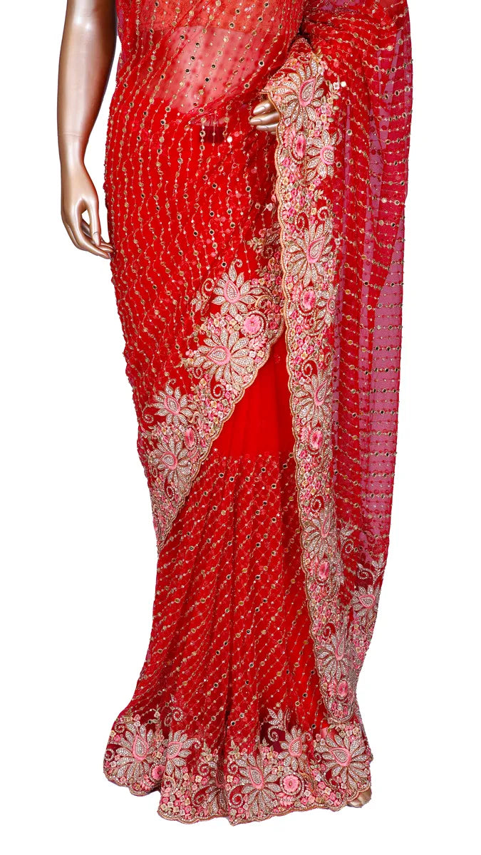 Red soft net saree with fancy embroidery and mirror work