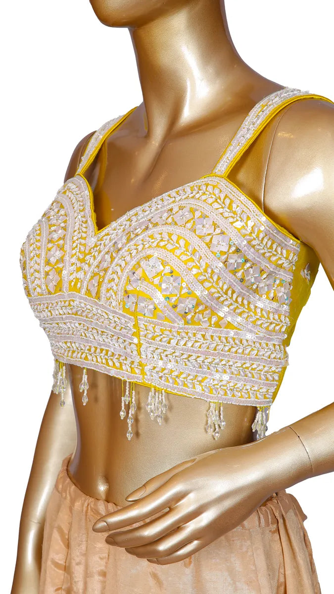 Yellow soft organza saree with Banarasi zari weaving, pearl border, and readymade designer handwork blouse