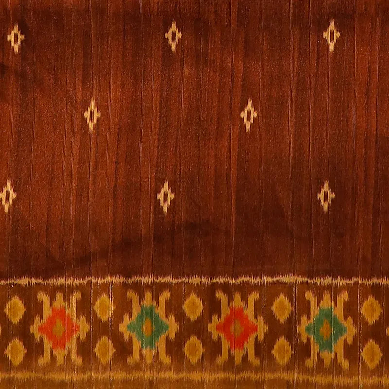 Beige tussar blend saree with Kalamkari prints and Patola border