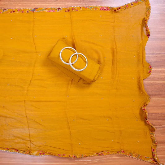 Mustard cotton unstitched suit with floral prints and zardozi handwork