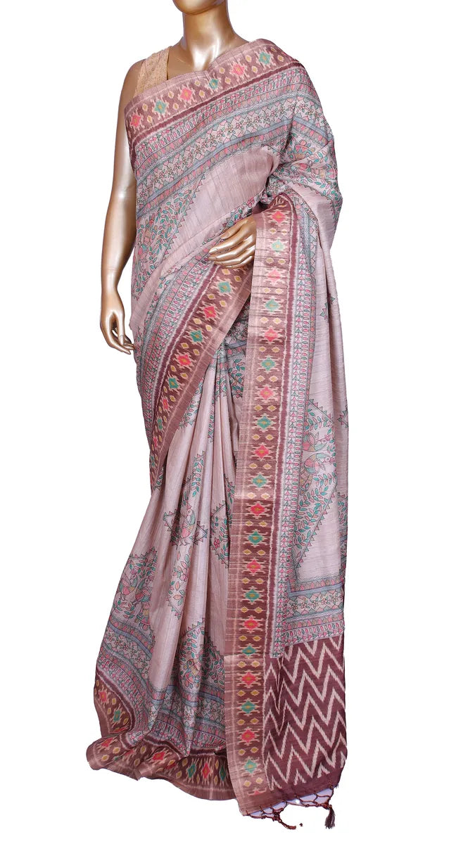 Beige tussar blend saree with Kalamkari prints and Patola border
