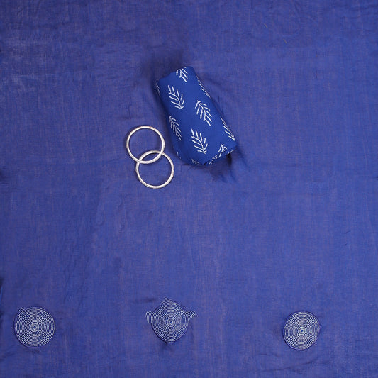 Deep blue cotton unstitched suit with all-over print and light beads work on V-neckline