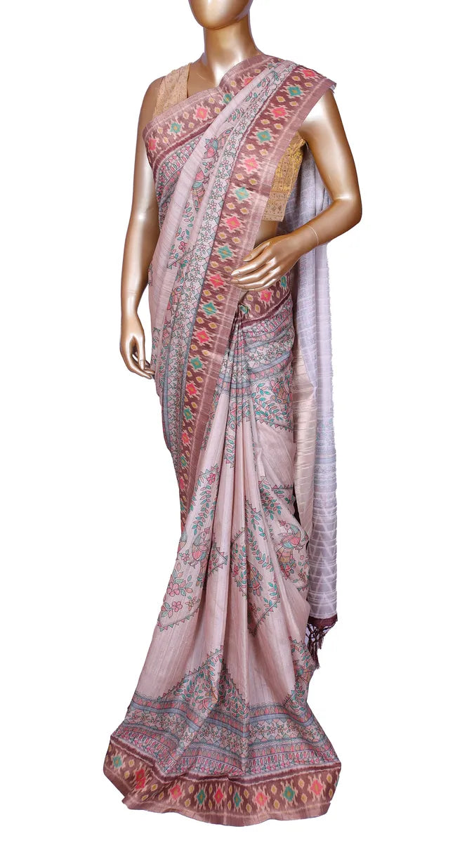 Beige tussar blend saree with Kalamkari prints and Patola border