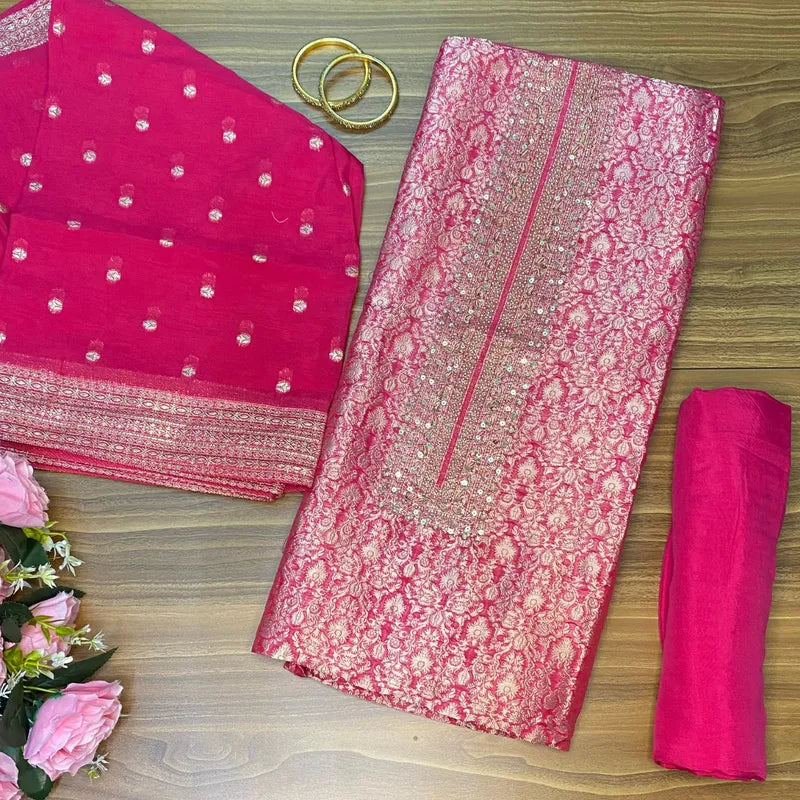 Rani colour Banarasi brocade unstitched suit with subtle handwork on neckline