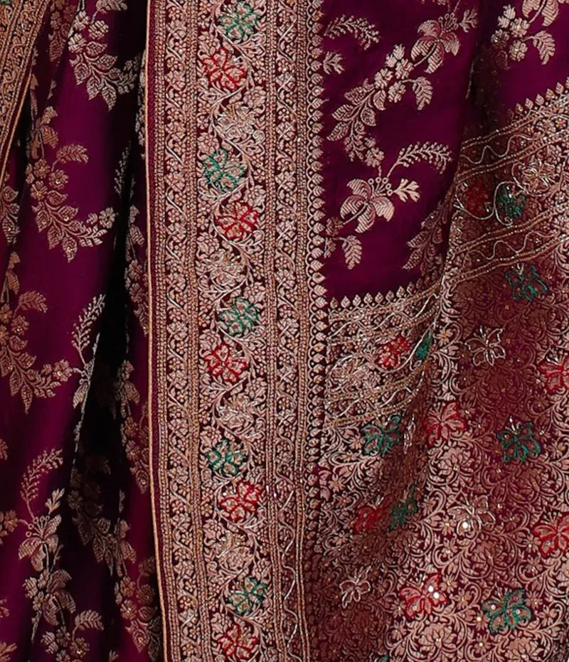 Wine crepe silk saree with Banarasi zari weaving, katdana and meenakari handwork on border, and rich pallu