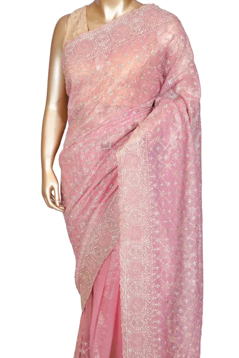 Soft tissue pink saree with zari embroidery and crystal work