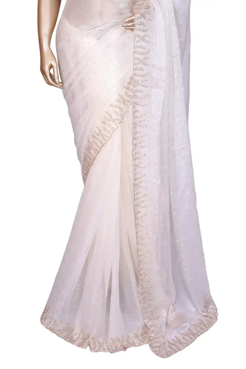 Off-White soft metallic organza saree with machine-pressed Swarovski crystal work border
