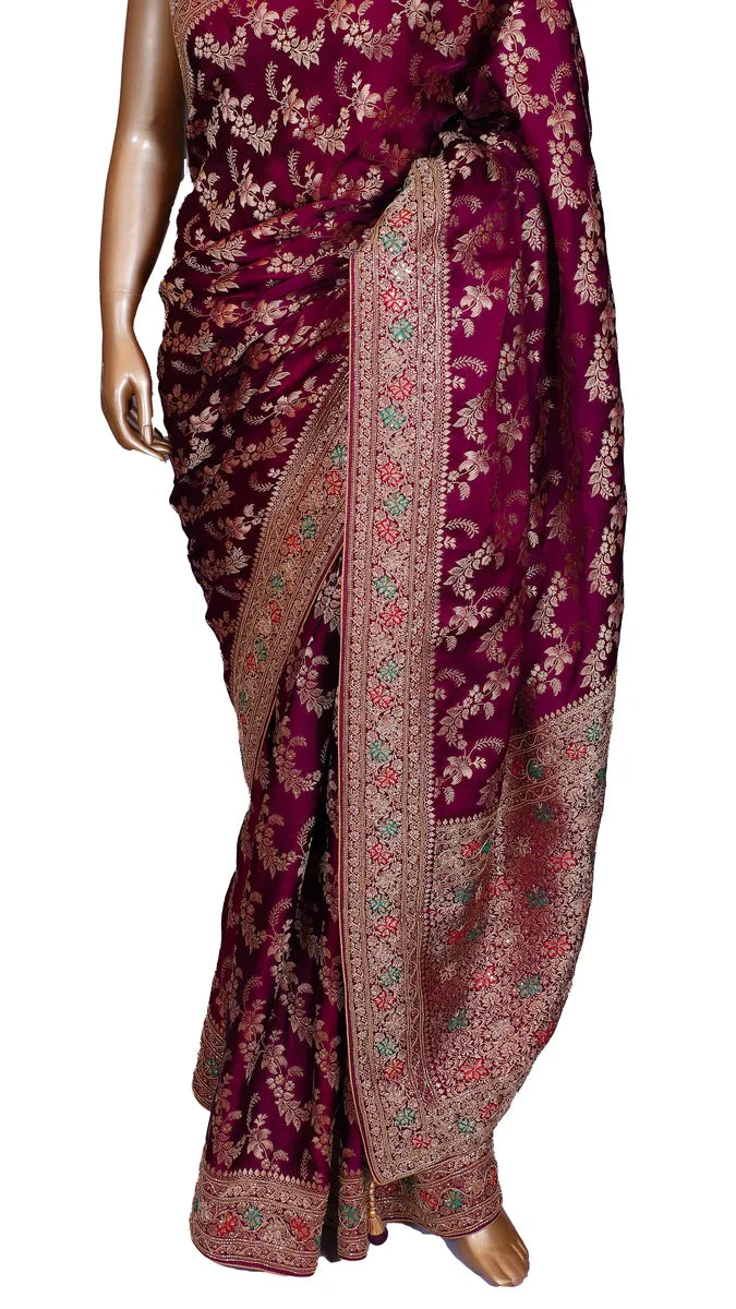 Wine crepe silk saree with Banarasi zari weaving, katdana and meenakari handwork on border, and rich pallu