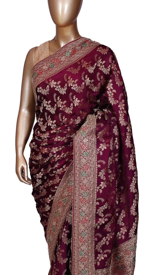 Wine crepe silk saree with Banarasi zari weaving, katdana and meenakari handwork on border, and rich pallu