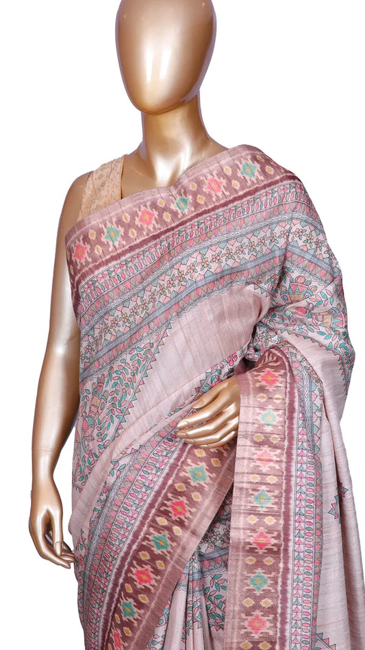 Beige tussar blend saree with Kalamkari prints and Patola border