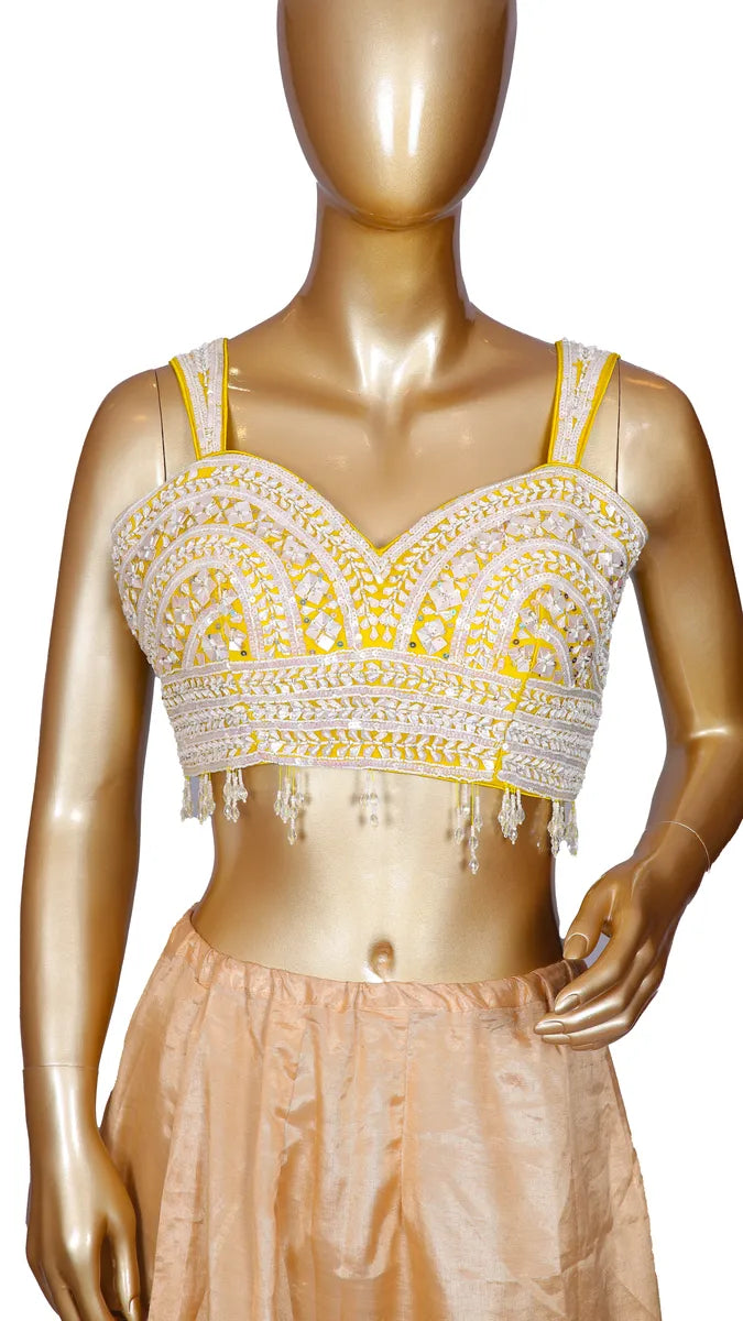 Yellow soft organza saree with Banarasi zari weaving, pearl border, and readymade designer handwork blouse