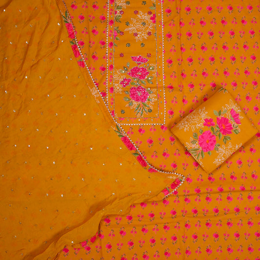 Mustard cotton unstitched suit with floral print and French knot handwork on neckline