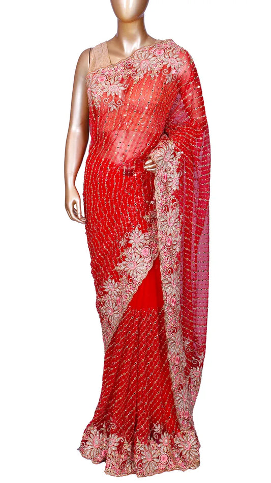 Red soft net saree with fancy embroidery and mirror work