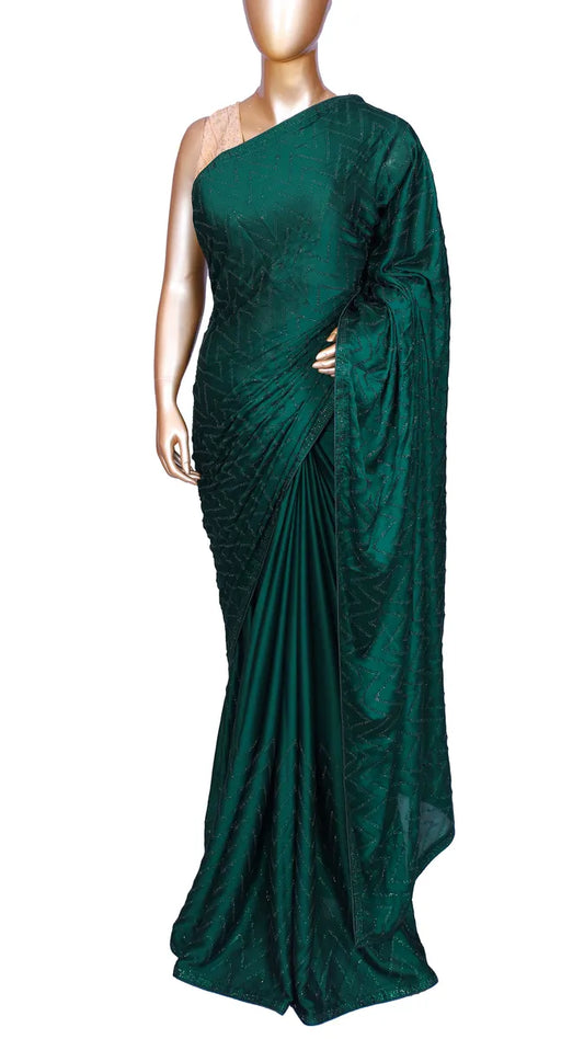 Bottle green satin saree with machine-pressed Swarovski crystal work