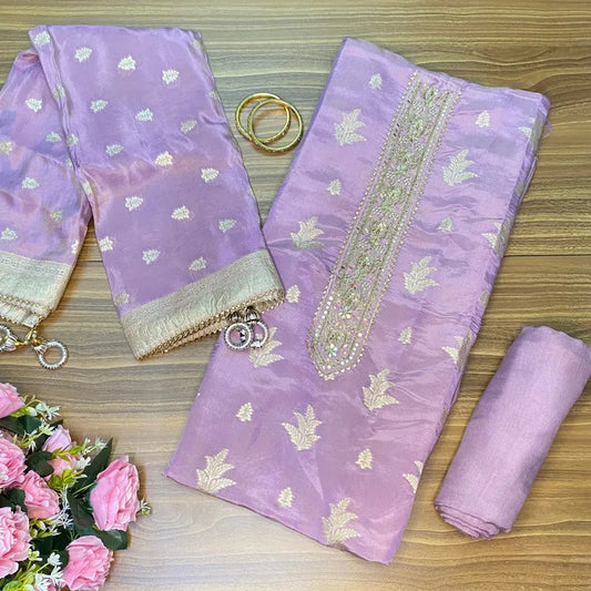 Light lilac silk unstitched suit with tissue and zari weaving and zardozi handwork on neckline