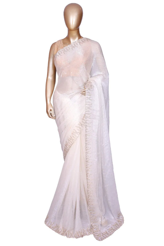 Off-White soft metallic organza saree with machine-pressed Swarovski crystal work border