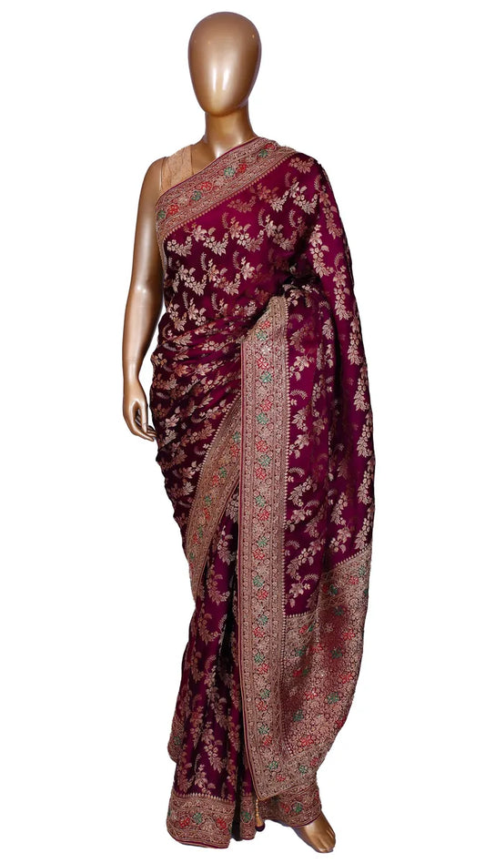 Wine crepe silk saree with Banarasi zari weaving, katdana and meenakari handwork on border, and rich pallu